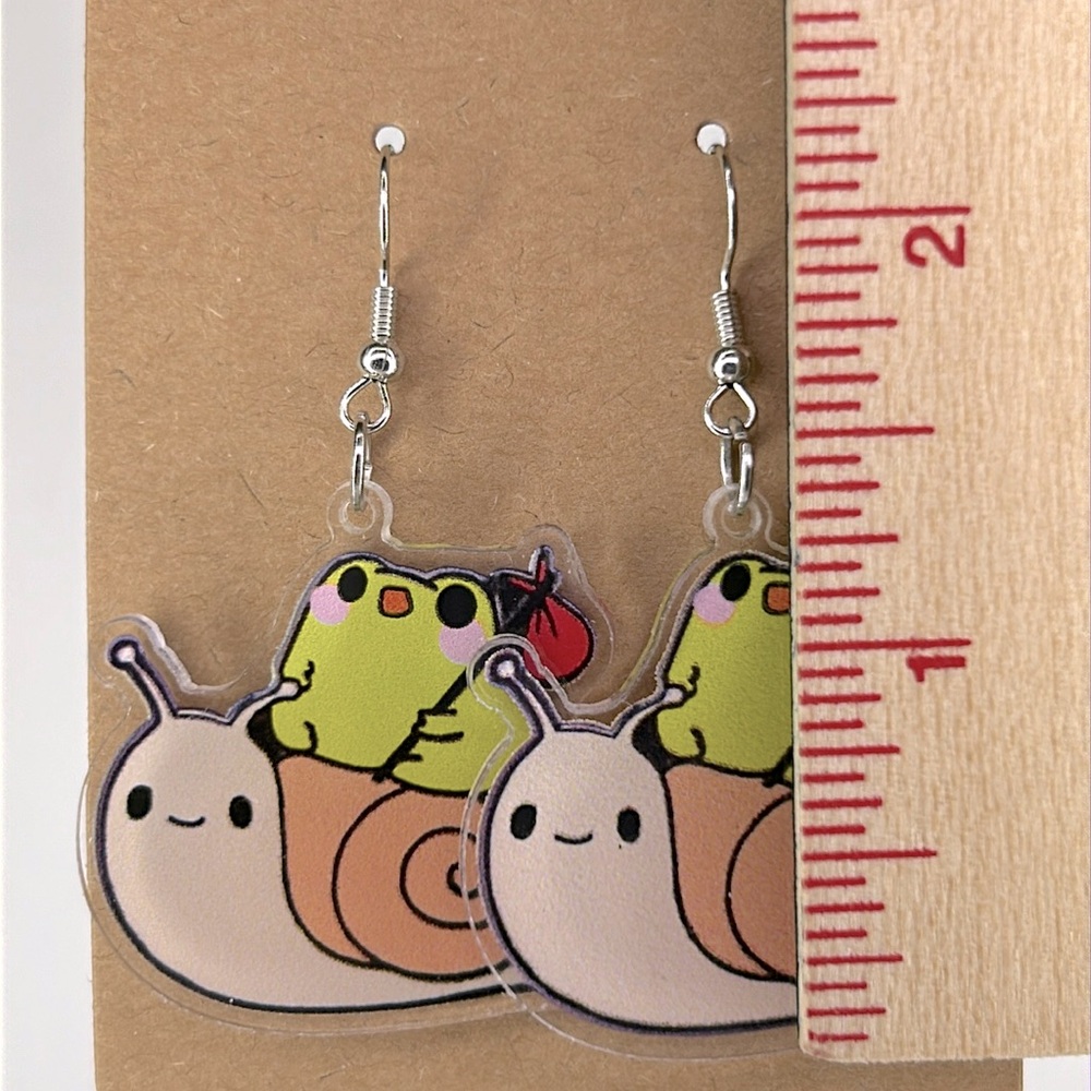 Frog Hitchhiking On A Snails Shell 2D Acrylic Cartoon Earrings - Picture 3 of 5